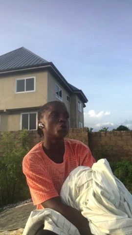 A wild woman multitasks by folding clothes and twerking in the nude porn video