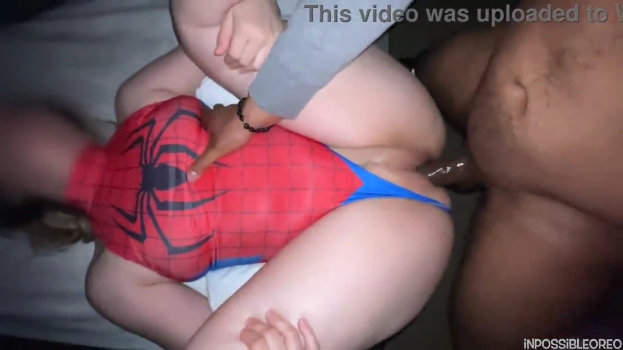 Spider girl engages in intercourse with a black man's penis porn video